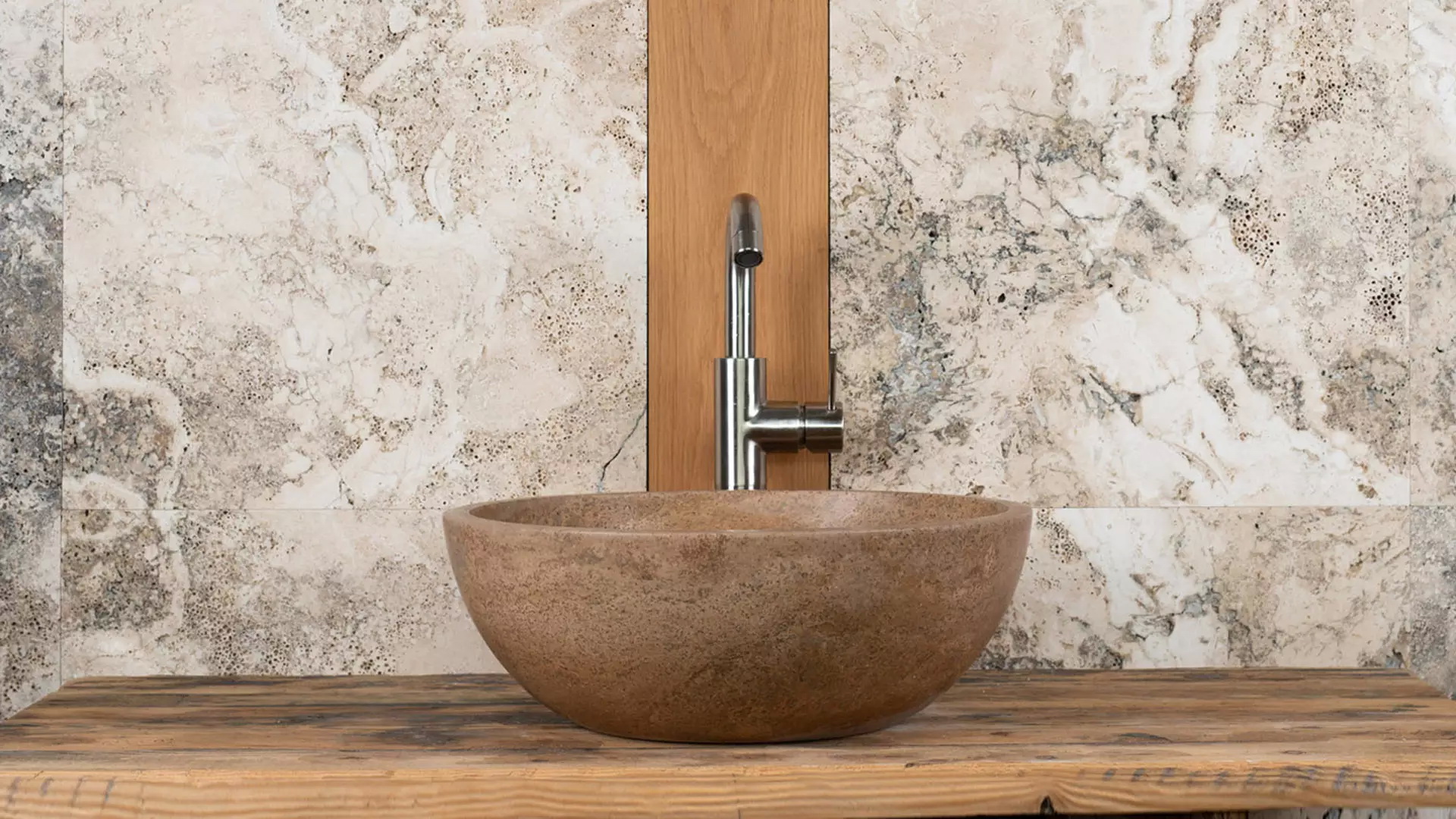 Round travertine washbasin “Ball Scuro”