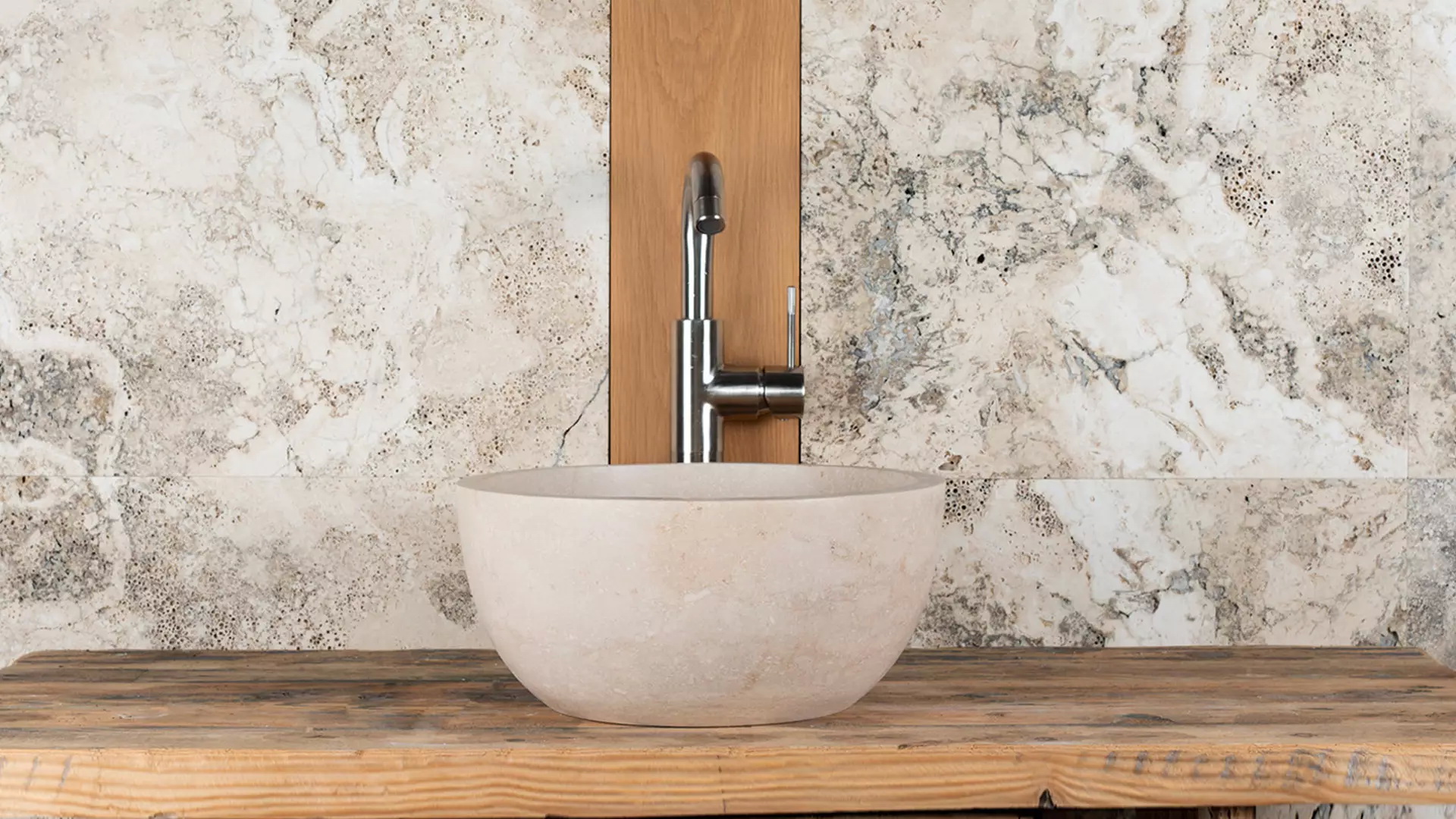 Small round travertine sink “Fianino”