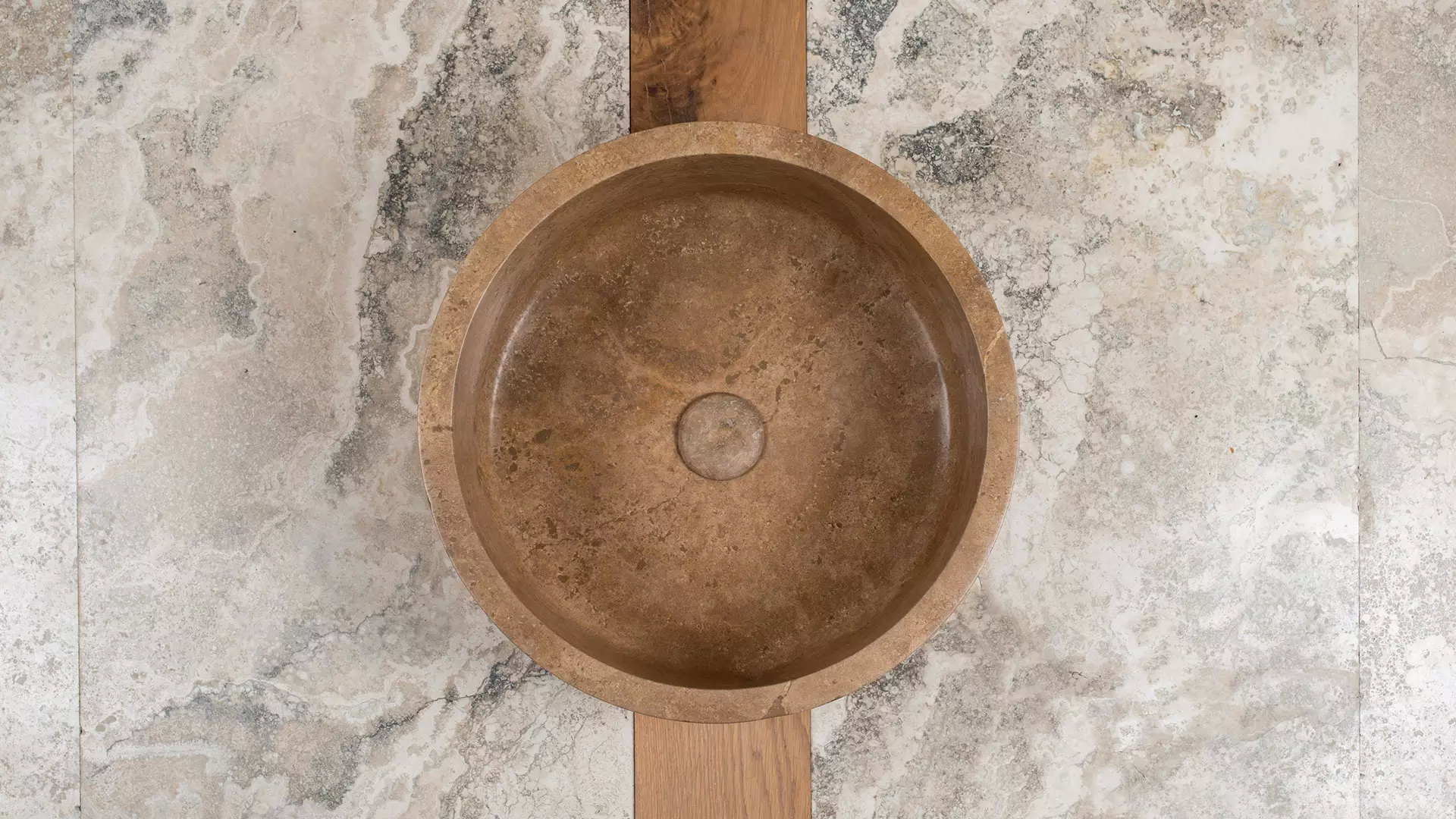 Walnut travertine washbasin “Tonda Scura”